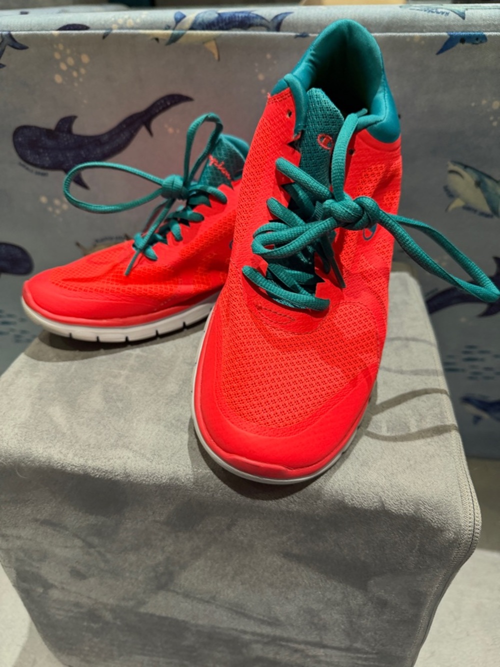 Champion Red Athletic Shoes with Teal Accents